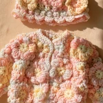 Baby Mütze und Jacke mit Blumen