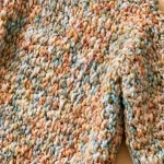 Babyjacke mit nostalgischem Muster häkeln