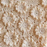 Gänseblümchen Babyjacke selber machen